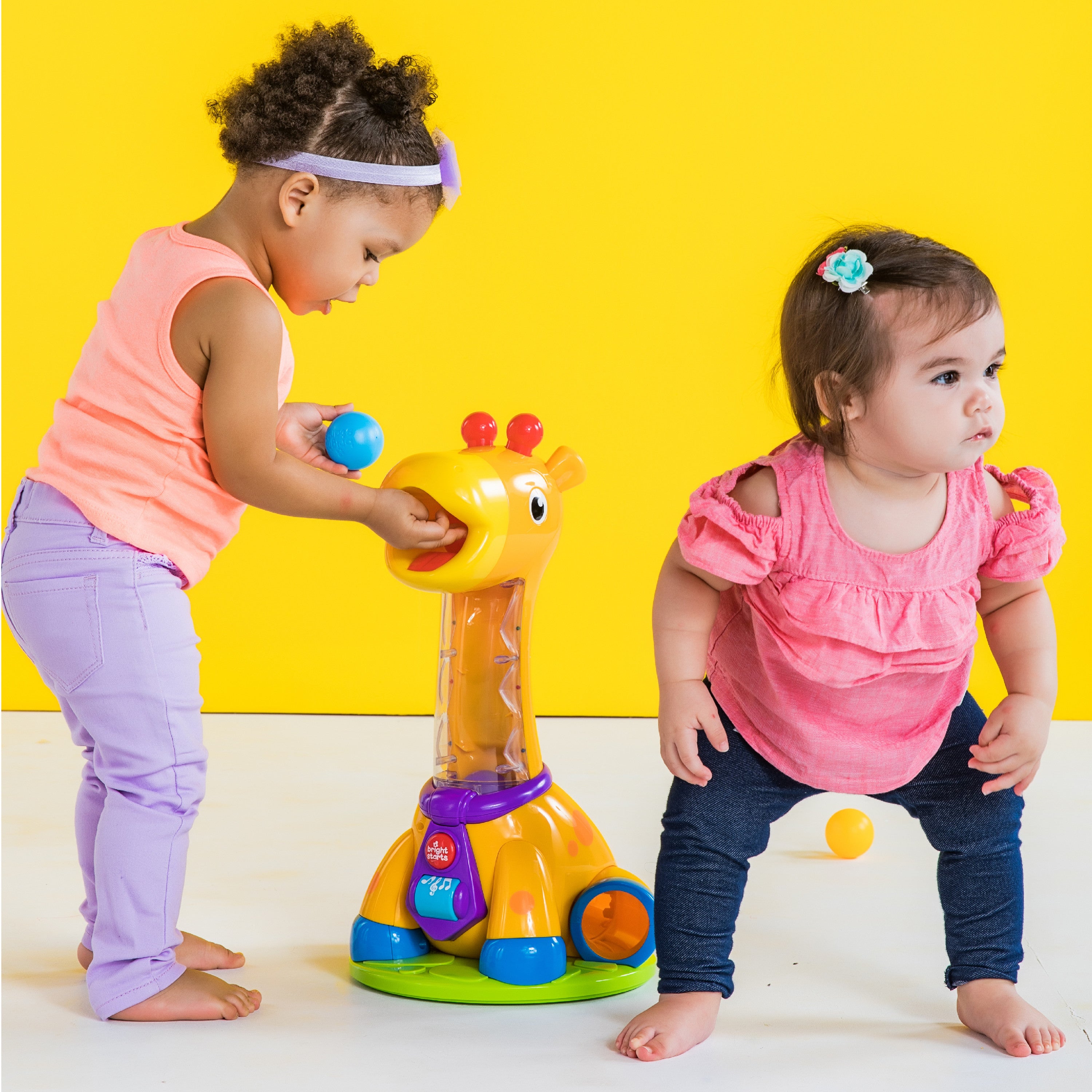 Bright Starts Spin & Giggle Giraffe Ball Popper Musical Baby & Toddler Toy